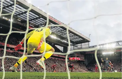  ?? PHOTO: GETTY IMAGES ?? Hold the line . . . Liverpool goalkeeper Alisson Becker braces as Manchester City’s Riyad Mahrez prepares to take a penalty in a English Premier League game played at Anfield yesterday. Mahrez’s strike sailed over the bar.