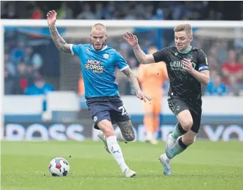  ?? ?? Joe Ward in action for Posh against Rovers.