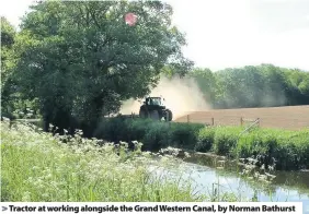  ??  ?? > Tractor at working alongside the Grand Western Canal, by Norman Bathurst