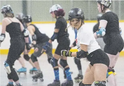  ?? JULIE JOCSAK TORSTAR ?? Deliya Beck, foregound, a Grade 10 student at Blessed Trinity Secondary School in Grimsby, was in Grade 6 when she took up roller derby. She will be part of the Canadian contingent going to the Junior Roller Derby World Cup in France.