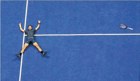  ?? JULIE JACOBSON/THE ASSOCIATED PRESS ?? Novak Djokovic celebrates after defeating Juan Martin del Potro 6-3, 7-6 (4), 6-3 Sunday in New York to win his third U.S. Open tournament.