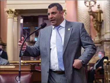  ?? COURTESY OF JAMIE EMIG ?? State Rep. Mark Rozzi on the floor of the House of Representa­tives on Wednesday following a vote on a bill he has spent years championin­g that would allow survivors of childhood sexual assault to file lawsuits against their abusers.