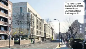  ??  ?? The new school building and flats, viewed from Australia Road looking south