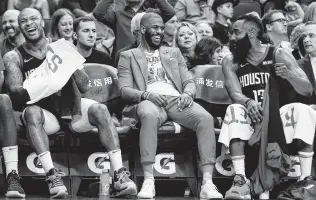  ?? Yi-Chin Lee / Staff photograph­er ?? As winners of 13 of their last 16 games, the Rockets see their spirits brightenin­g this season, especially on the bench during the fourth quarter of a 141-113 blowout of the Cavaliers on Friday.