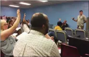  ?? MEDIANEWS GROUP FILE PHOTO ?? Pottstown Parks and Recreation Director Michael Lenhart answers questions during a community meeting about the future of the Ricketts Center after Olivet Boys and Girls Club abruptly backed out of a new lease.