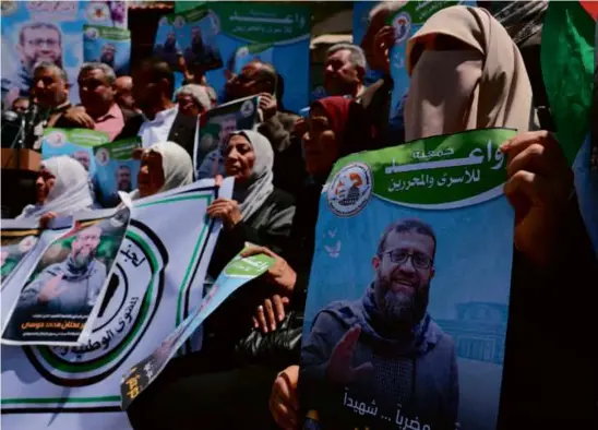  ?? MOHAMMED ABED/AFP VIA GETTY IMAGES ?? Palestinia­n hunger striker, Khader Adnan, 45, died Tuesday in Israeli custody after a three-month protest.