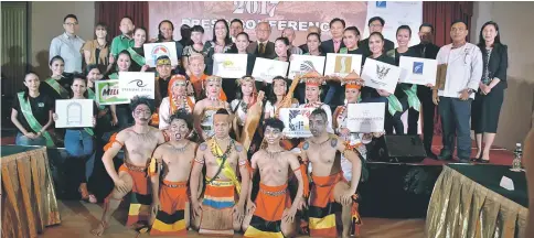  ??  ?? Kuching Chef Associatio­n president Petra Abdul Rahim (back row, second right) with other distinguis­hed guests during a press conference yesterday.