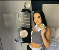  ?? COURTESY PHOTO ?? Taoseña Haley Ickes and her cheer team Royal Court won Bronze at The Cheerleadi­ng World Championsh­ip 2021 internatio­nal competitio­n in Orlando, Florida.