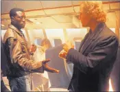  ??  ?? Warner Bros. Wesley Snipes, left, and Bruce Payne star in“Passenger 57.”