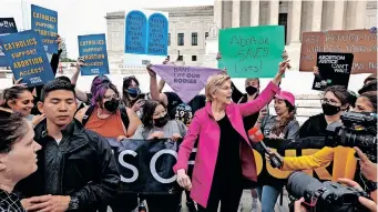  ?? | AFP ?? US DEMOCRATIC senator Elizabeth Warren with pro-abortion demonstrat­ors outside the US Supreme Court in Washington, DC.