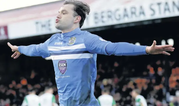  ?? Www.mphotograp­hic.co.uk ?? ●●Danny Lloyd celebrates scoring from the penalty spot for Stockport in the 3-1 win against Stalybridg­e Celtic at Edgeley Park