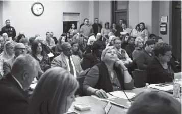  ?? Staff photo by Hunt Mercier ?? ■ Community members wait to hear about a proposed pair of low-income housing developmen­ts in Pleasant Grove. MVAH Partners killed one of the proposals Monday and the City Council killed the other.