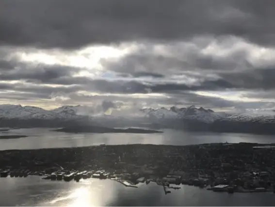  ?? (All photograph­s by Josie Cox) ?? Steely grey skies over the harbour at Tromso, a city with a no-nonsense attitude to living