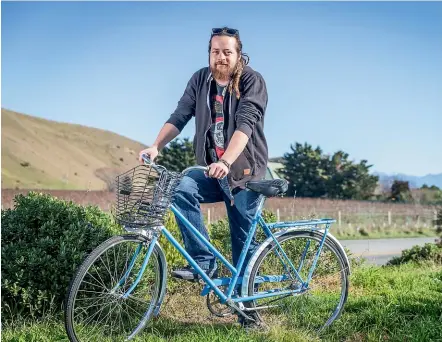  ?? RICKY WILSON/STUFF ?? Riverlands Roadhouse employee George Ilko on the proposed cycleway along State Highway 1 near Blenheim in 2017.
Whale Trail Trust chairman Luke van Velthooven