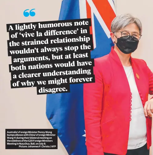  ?? ?? Australia's Foreign Minister Penny Wong bumps elbows with China's Foreign Minister Wang Yi during their bilateral meeting on the sidelines of the G20 Foreign Ministers Meeting in Nusa Dua, Bali, on July 8.
Picture: Johannes P. Christo / AFP