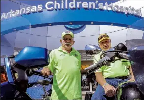  ?? Arkansas Democrat-Gazette/JOHN SYKES JR. ?? Harold Wilson (left) and Bill Martin, co-chairman and chairman of Arkansas Bikers for Children, park their bikes right in front of Arkansas Children’s Hospital. The organizati­on has raised more than $300,000 for the hospital in just 5½ years.