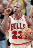  ?? Associated Press ?? Michael Jordan
Intensity for a pickup game