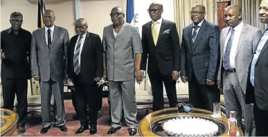  ??  ?? Lesotho prime minister Tom Thabane, third from left, has told President Cyril Ramaphosa’s envoys led by Jeff Radebe, second from left, that he wants to step down.