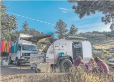  ?? Joshua Berman, Special to The Denver Post ?? A rented teardrop trailer from Colorado Teardrops provides a camp stove, bins, shade and more for a two-family campout.