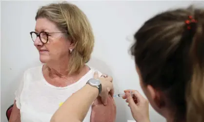  ?? Photograph: Lisa Maree Williams/Getty Images ?? The national cabinet has decided over-50s will be offered the AstraZenec­a vaccine at GP clinics from mid-May and Pfizer will be restricted to under-50s.