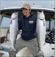  ?? PHOTO COURTESY OF RAY FAIRFAX ?? Michael McGahan of Brookings fished the salmon season opener out of Crescent City with friends, landing eight keeper kings and losing a few more trolling anchovies. The kings were 5 to 18 pounds.