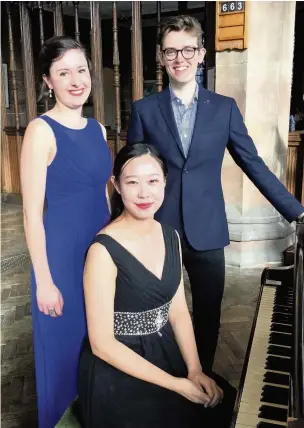  ??  ?? ●●Ann Wilkes, Ryan Hunt and Zi Xhang performed at the lunchtime concert at St Mary in the Baum church