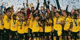  ?? SUE OGROCKI/ASSOCIATED PRESS ?? The Crew were in celebrator­y mode after securing the franchise’s third MLS Cup title with a win over LAFC on their home pitch in Columbus.