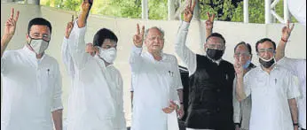  ?? HIMANSHU VYAS/HT ?? CM Ashok Gehlot with senior Congress leaders at a party meeting in Jaipur on July 13.