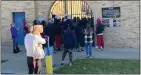  ?? FILE PHOTO ?? Dozens of students wait inside of Clintondal­e’s football stadium earlier this month due to a safety threat.