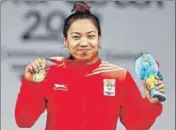  ?? GETTY ?? Mirabai Chanu is the world weightlift­ing champion in 48kg.