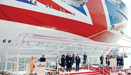  ?? ?? PUSHING THE BOAT OUT: The Queen and Prince Philip name P&O Cruises’ new flagship Britannia in 2015