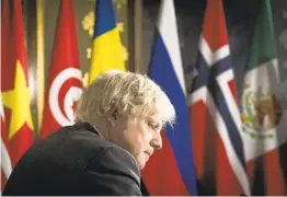  ?? STEFAN ROUSSEAU AP ?? Britain’s Prime Minister Boris Johnson chairs a session of the U.N. Security Council on climate and security via teleconfer­ence on Tuesday.