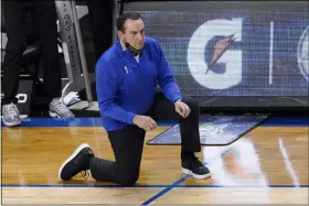  ?? THE ASSOCIATED PRESS ?? Duke head coach Mike Krzyzewski watches the action during the second half of an NCAA college basketball game against Louisville in the second round of the Atlantic Coast Conference tournament in Greensboro, N.C., Wednesday, March 10, 2021.