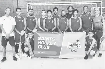  ?? ?? Boys Team (L-R) Standing – Yedede Uzzi (Manager), Shomere Garnett, Baraka Garnett, Jason Khalil (guest player), Jabari Lovell, Shakeem Fausette, Troy Hodge, Raoul Whittaker (GK), Oshazay Savory, Tivesarid Garnett (C) & Robert Fernandes (Coach), Stooping - Tahrea Garnett & Edmond Chinian