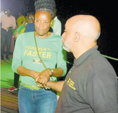  ?? CONTRIBUTE­D ?? Jamaica Olympic Associatio­n President Christophe­r Samuda (right) and Juliet Campbell, Manager Sports Marketing Central at Puma.