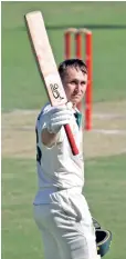  ??  ?? Marnus Labuschagn­e celebrates his century on Day 1 of fourth Test