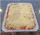  ?? ANTHONY VAZQUEZ/SUN-TIMES ?? Marci Sieracki’s lasagna ready is for the oven.