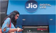  ??  ?? Jio has over 400 million subscriber­s, but has seen slower growth in customer addition in recent months