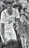  ?? CP PHOTO ?? Toronto Raptors’ Delon Wright celebrates his late three-point field goal against the Washington Wizards during NBA playoff action Wednesday night in Toronto.