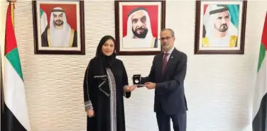  ?? ?? ↑ Dr Maryam Butti Al Suwaidi and Jamal Saleh after the meeting in Abu Dhabi.