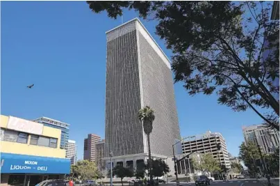  ?? SANDY HUFFAKER FOR THE U-T ?? The mayor and two San Diego City Council members announced Monday that they had reached a settlement deal with the landlord and lender of 101 Ash St. to buy out the lease for that building and the Civic Center Plaza.