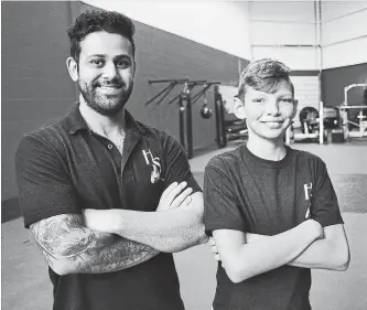  ?? IAN STEWART SPECIAL TO THE RECORD ?? Matthew McDonald, right, trains at Hotshot Athletic Martial Arts in Cambridge with sifu Julian Shamuon. McDonald has studied with Shamuon ever since he began martial arts.