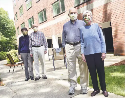  ?? Arnold Gold / Hearst Connecticu­t Media ?? Steve and Georgia Jennings, left, and Al and Blanche Agostinell­i are photograph­ed at the Whitney Center in Hamden on Wednesday.