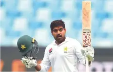  ?? AFP ?? Pakistan’s Haris Sohail celebrates his century during the second day of the second Test against New Zealand in Dubai.