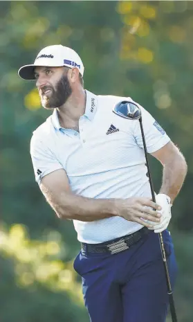  ?? Tim Warner / Houston Chronicle ?? Dustin Johnson, who has recovered after testing positive for the coronaviru­s. is among 37 players at the Houston Open who are playing in the Masters.