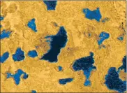  ?? Picture: NASA/REUTERS ?? LIQUID: This composite image from Cassini shows evidence of seas, probably filled with liquid methane or ethane, on Saturn’s moon Titan.