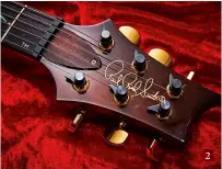 ??  ?? 2 2. Here, the Dragon II’s headstock has Paul Reed Smith’s signature inlaid in gold