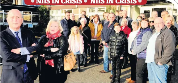  ??  ?? Outrage MSP John Scott with anxious relatives of the patients outside the Ailsa Hospital, Ayr