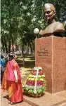  ?? — PTI ?? External affairs minister Sushma Swaraj pays tribute to India’s second PM Lal Bahadur Shastri at his memorial in Tashkent on Sunday. She later flew back to India.