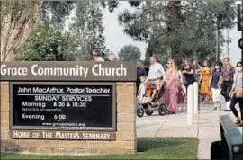  ?? Genaro Molina Los Angeles Times ?? WORSHIPERS head to Sunday service at Grace Community Church in Sun Valley last month. Against orders, the church has had thousands at indoor services.